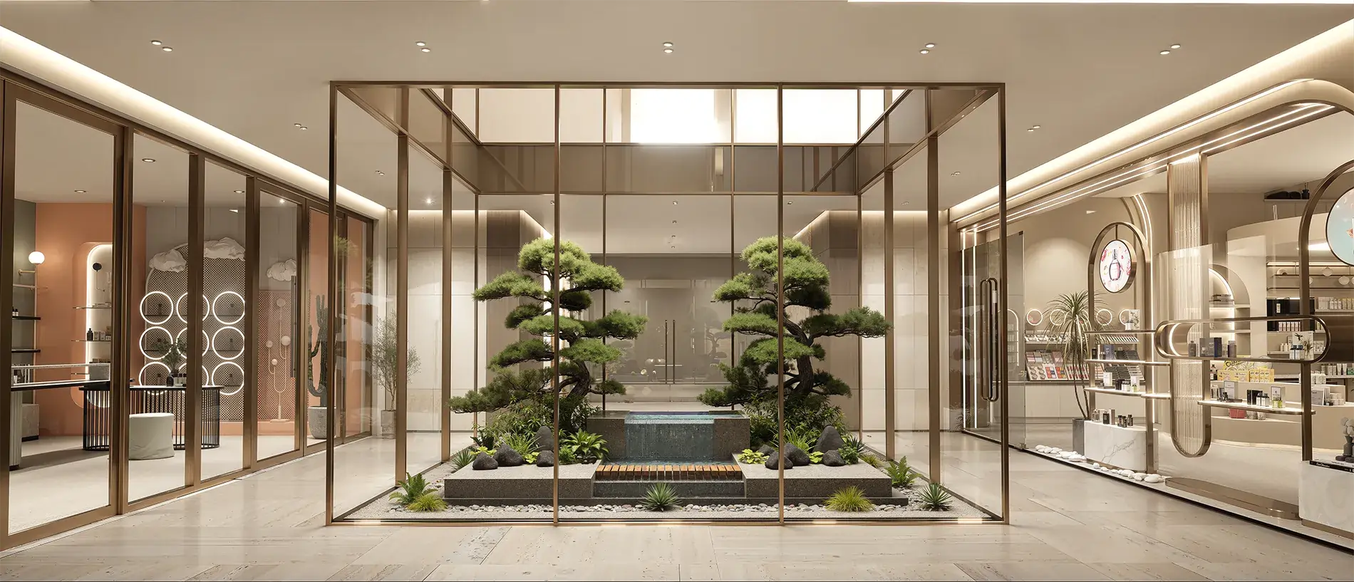 Indoor luxury shopping atrium with a glass-walled central garden featuring trimmed trees and a water feature in the middle.